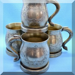 K21. Set of 4 white Metal mugs. 4”h - $12 
